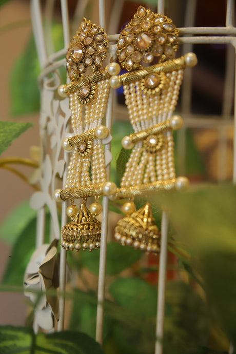 Golden Kundan jhumka with cream pearls